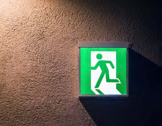 Lampshade PVC Film covering green exit sign - Material Solutions Ireland